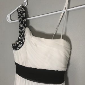 One shoulder formal dress.